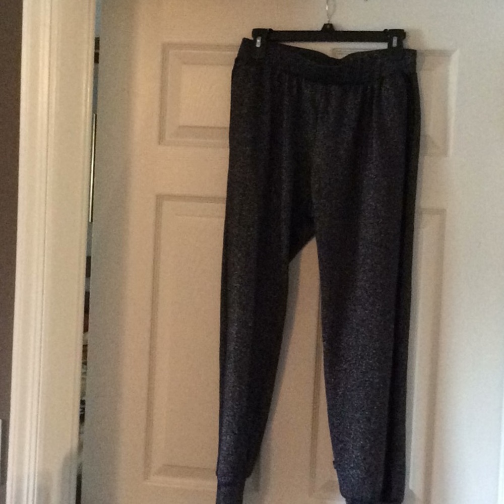 Zara Terez glitter jogger with black stripe.